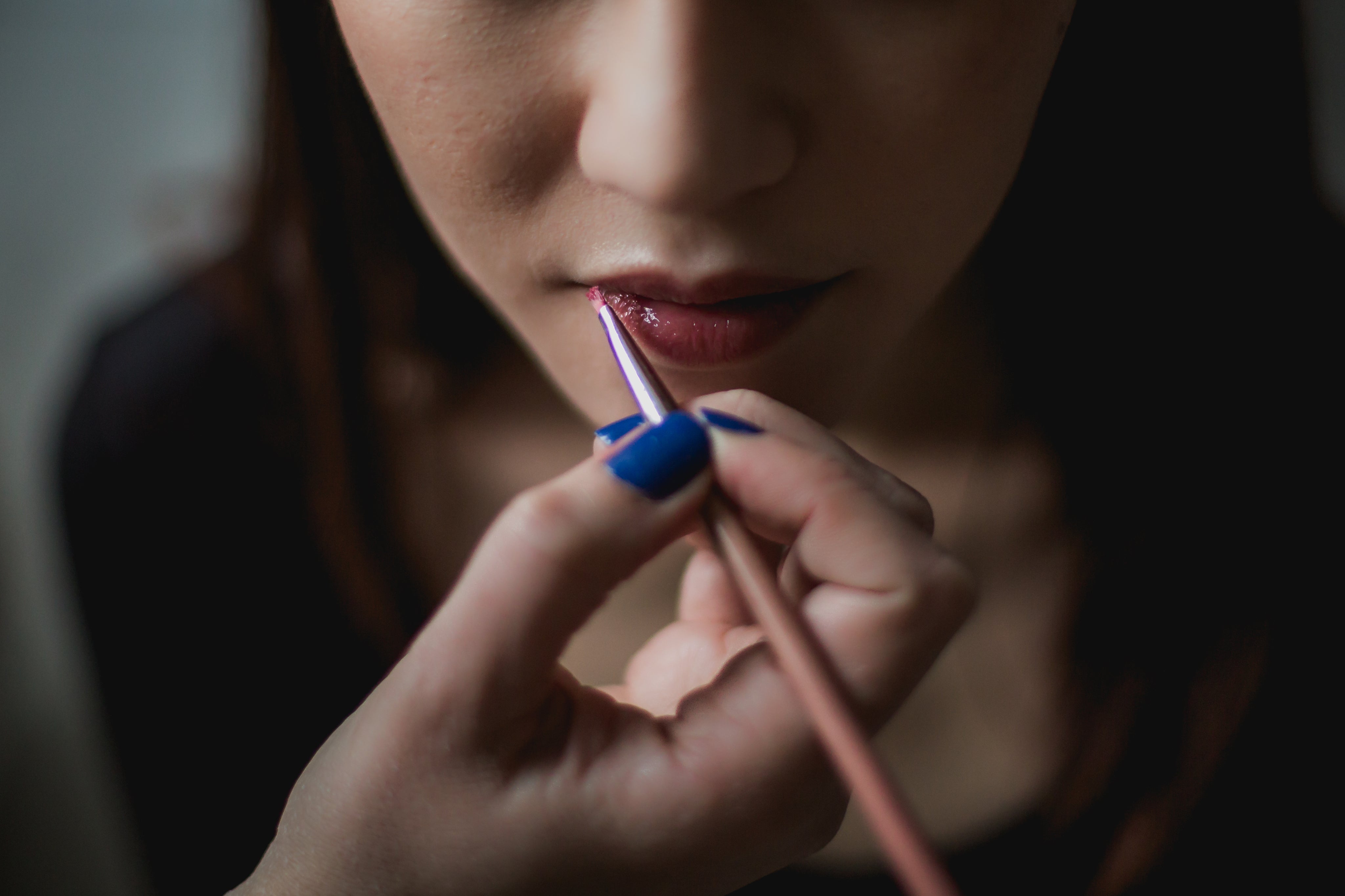 woman-getting-lip-makeup.jpg